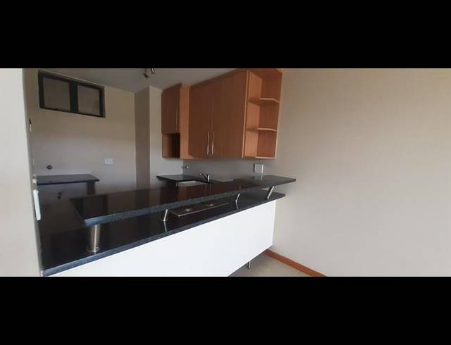 2 BEDROOM APARTMENT FOR SALE IN ROOIHUISKRAAL NORTH